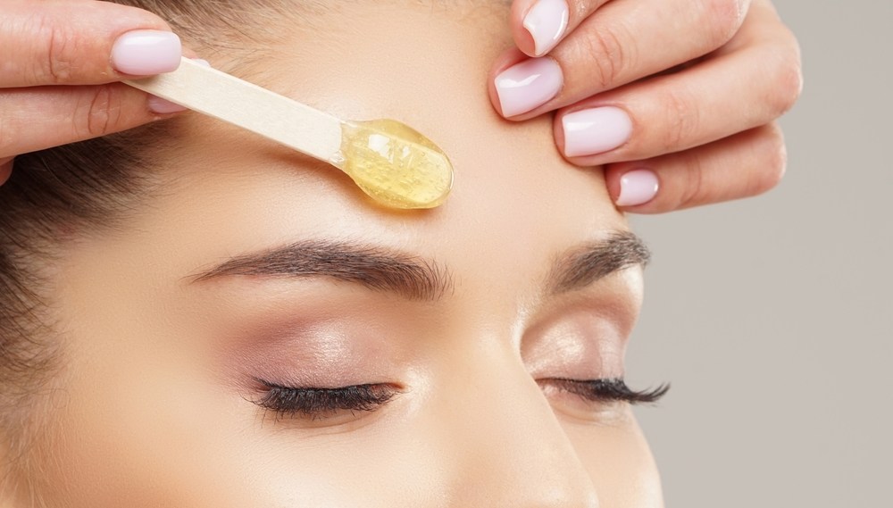 Waxing treatment in progress at the studio