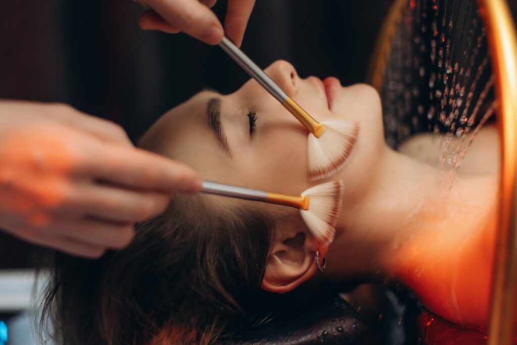 Client deeply relaxed during a head spa treatment