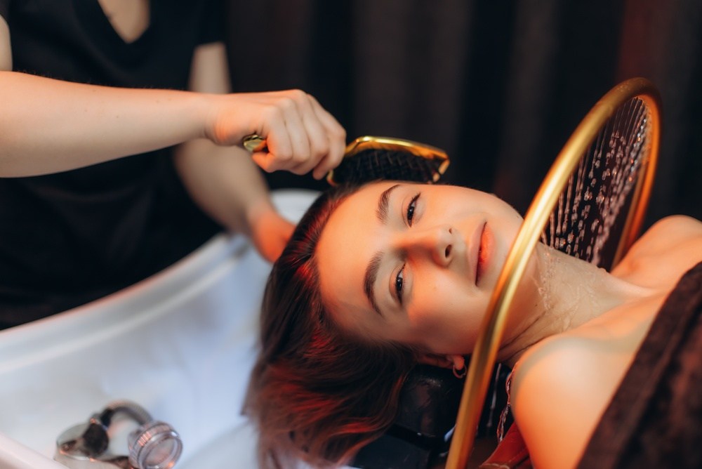 Warm water flowing during a Japanese head spa treatment