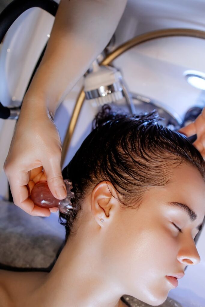 Close-up of a Japanese head spa scalp treatment at the basin