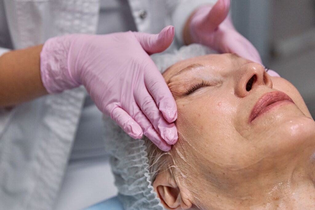 Specialist performing a plasma fibroblast treatment